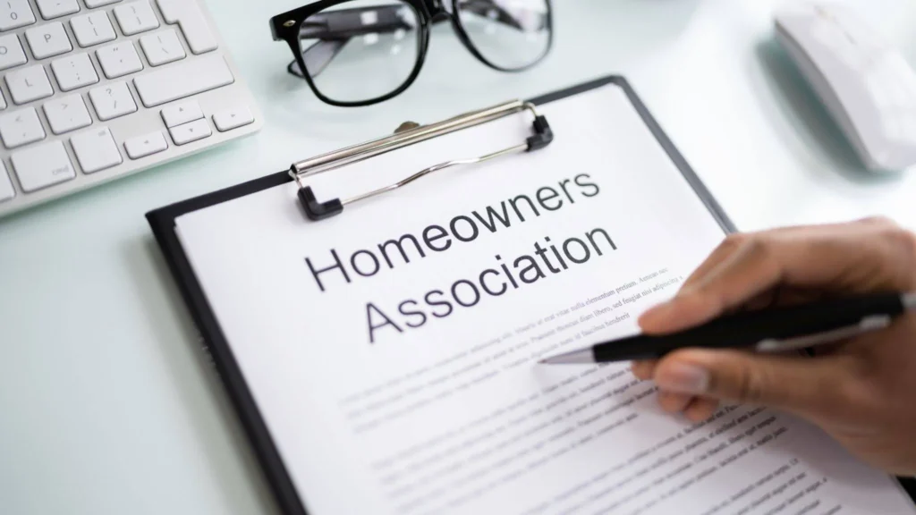 HOA board reviewing assessment increase calculations